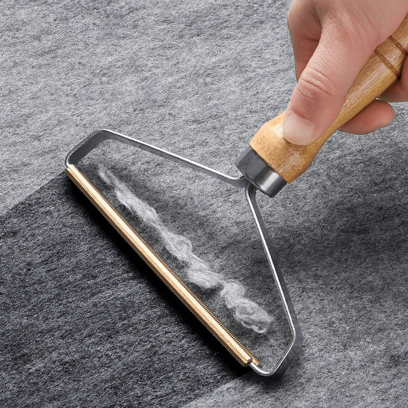 Removedor manual de pelo para tapicería
